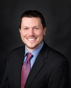 Headshot of Brett Benzin