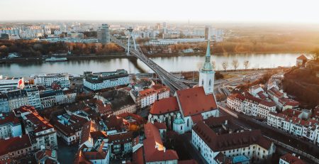 Areal photo of red roof buildings and city of Bratislava, Slovakia